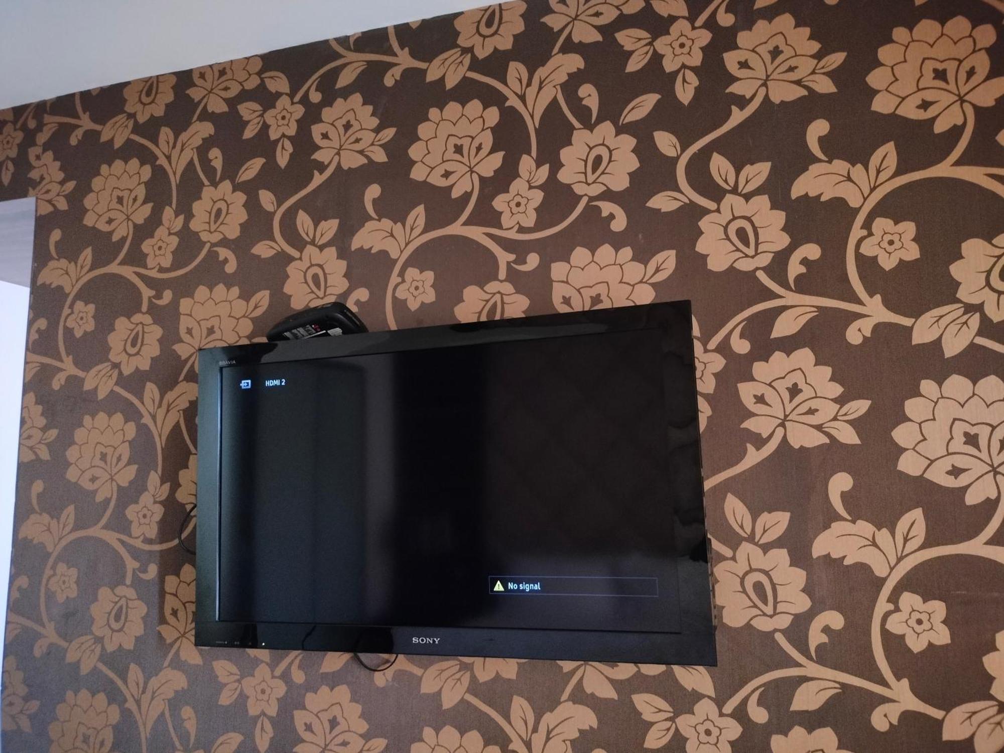 Holiday Inn Chandigarh Panchkula, An Ihg Hotel Εξωτερικό φωτογραφία A television mounted on a wall